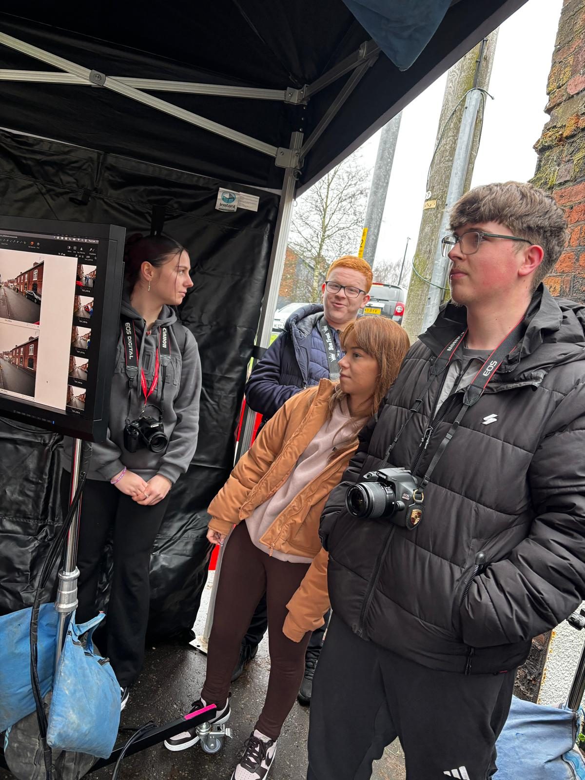 Crew working through the snow at night
